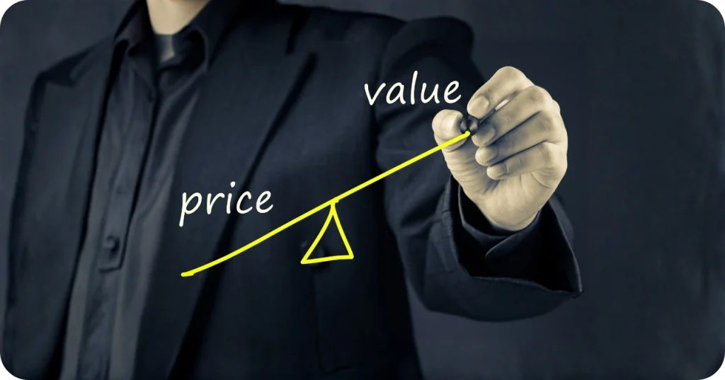 Hand drawing a line on a scale where "Value" is positioned higher than "Price," illustrating the cost-effectiveness of premium VCO suppliers.