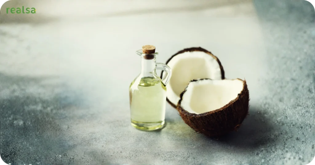 esthetic display of pure coconut oil and a split coconut half, representing the product standards of trusted VCO suppliers for private brands.